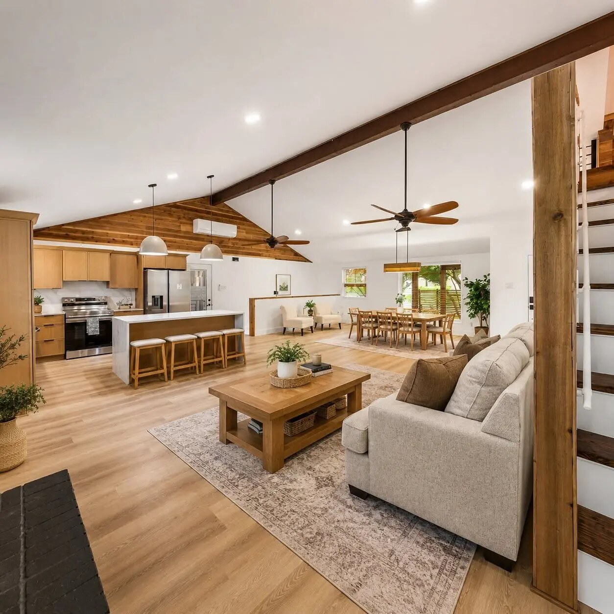 Modern rustic open-concept home staged in warm natural tones